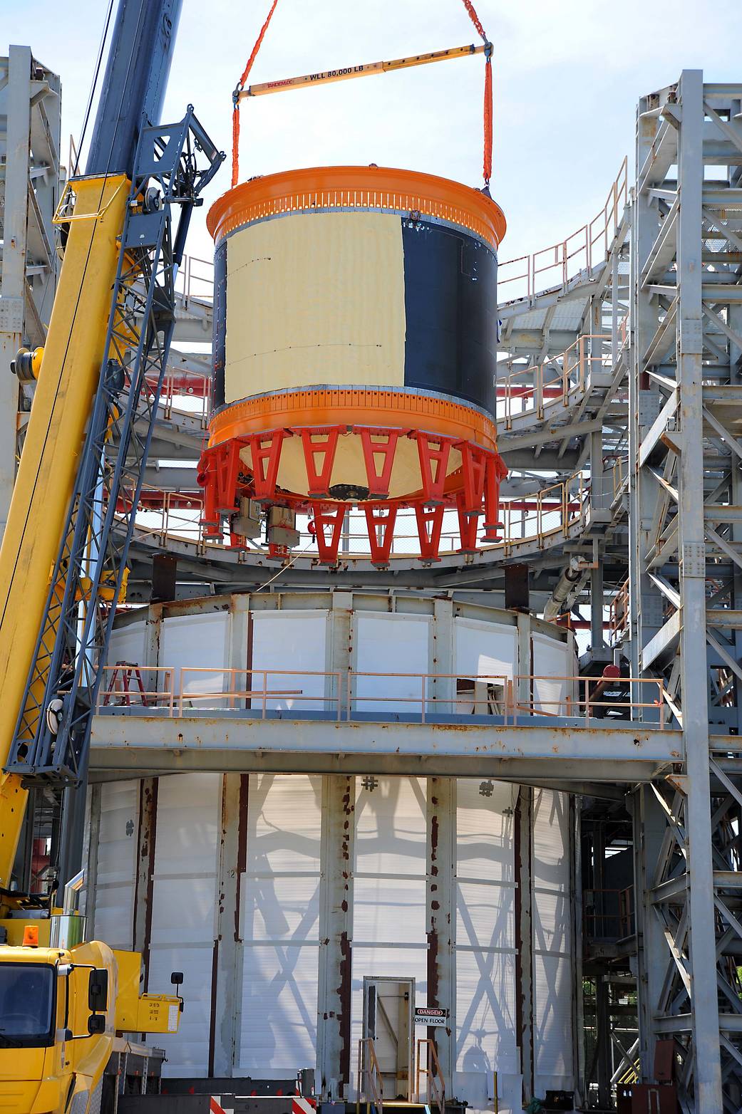 NASA's composite cryotank is lowered into a structural test stand where it was tested with cryogenic hydrogen and structural loa