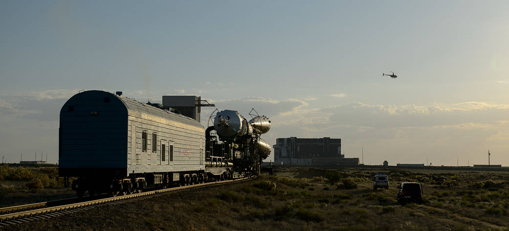 The Soyuz TMA-13M spacecraft is rolled out to the launch pad by train on Monday, May 26, 2014, at the Baikonur Cosmodrome in Kaz