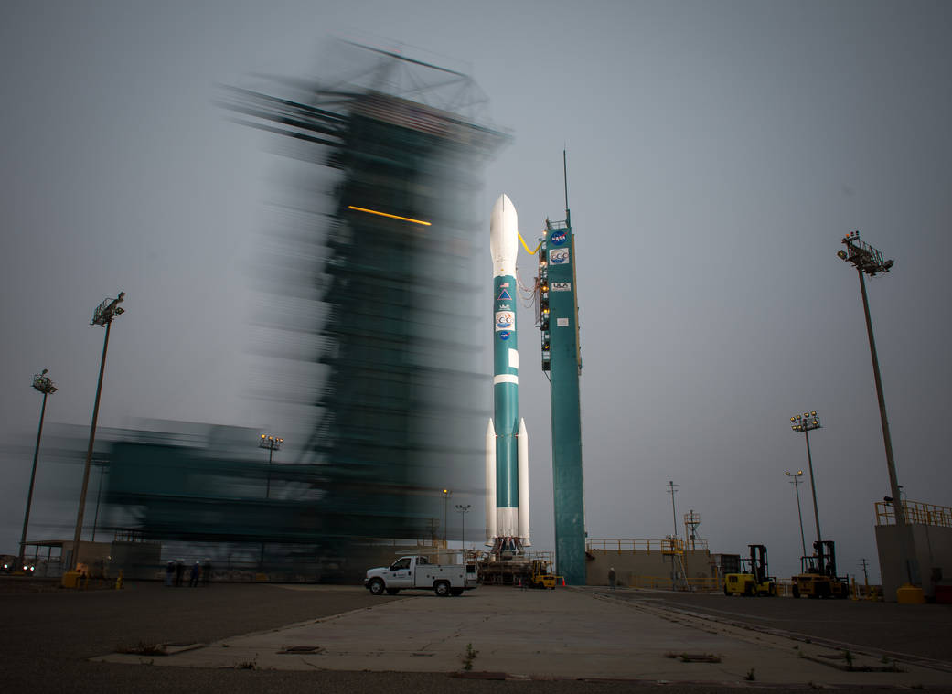 The launch gantry is rolled back to reveal the United Launch Alliance Delta II rocket with the Orbiting Carbon Observatory-2 (OC