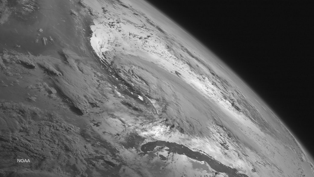 This image of Tropical Storm Arthur was taken by the GOES West satellite at the far eastern periphery of its scan, at 8 a.m. EDT
