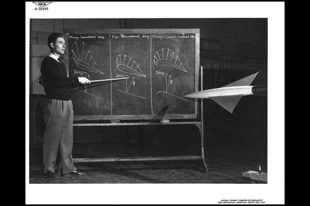 John W. “Jack” Boyd explaining the efficiencies of conical camber. National Advisory Committee for Aeronautics (NACA), Ames Aeronautical Laboratory, Moffett Field, California. (5 March 1957)