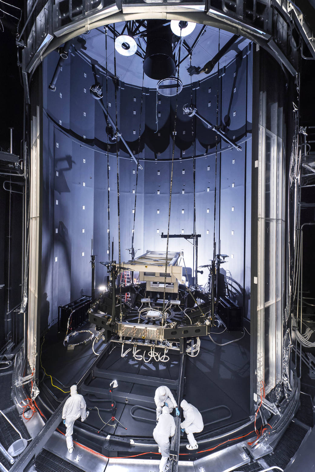 Engineers and technicians work outside Chamber A, the giant thermal vaccum chamber at Johnson Space Center.