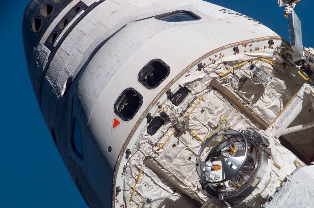 Closeup view of top of crew cabin of shuttle Atlantis in Earth orbit