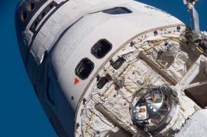 Closeup view of top of crew cabin of shuttle Atlantis in Earth orbit