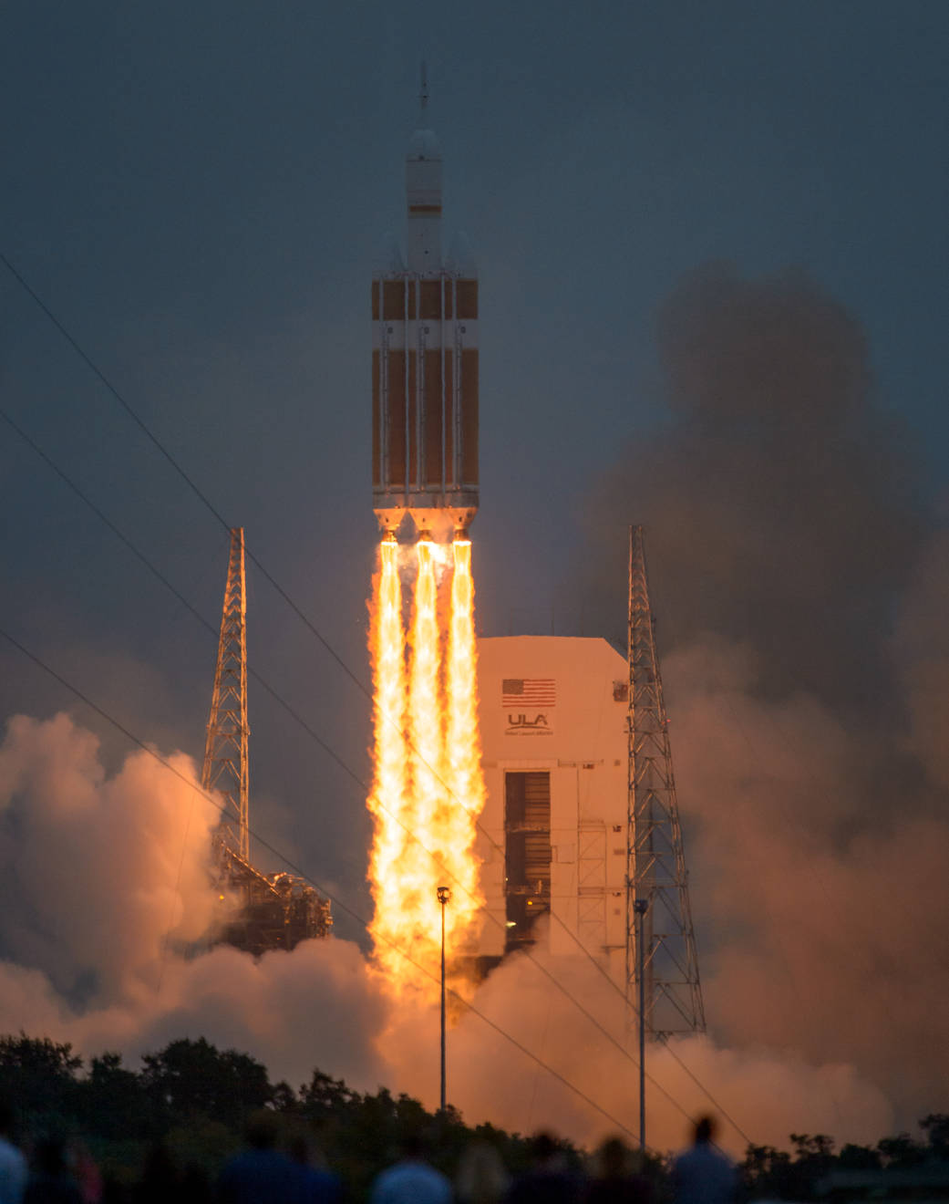 The ULA Delta IV Heavy rocket with NASA’s Orion spacecraft mounted atop, lifts off from Cape Canaveral Air Force Station.