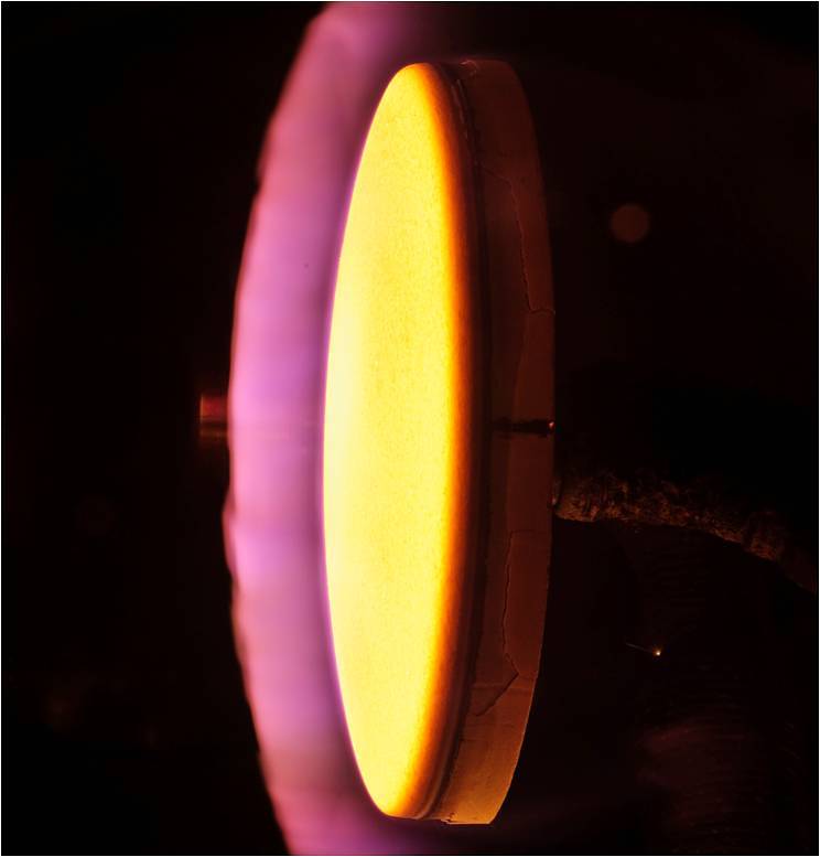 15-inch diamet4er PICA test sample in the arc jet