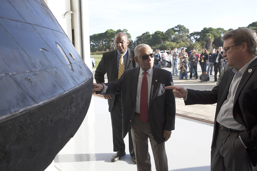 NASA Administrator Charles Bolden looks over the agency's Orion spacecraft at Kennedy Space Center on the morning of Jan. 6, 201