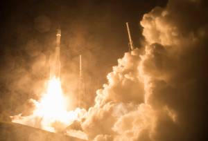 Fiery launch of MMS spacecraft aboard Atlas V rocket at nigthttime