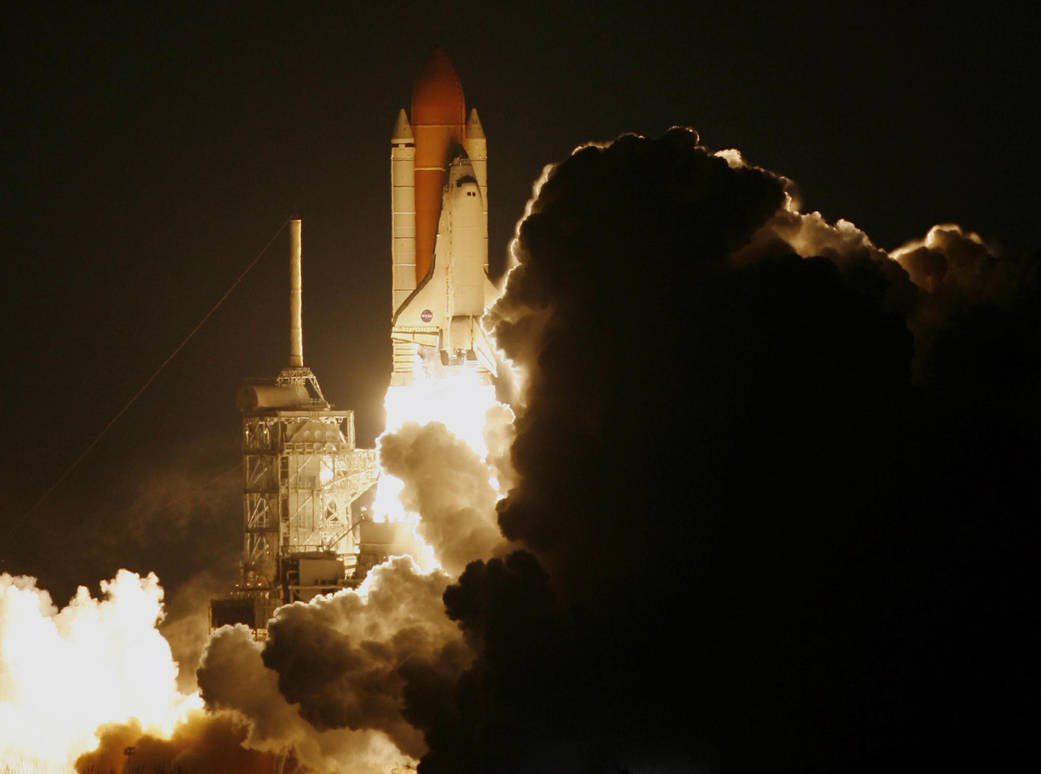Nighttime launch of shuttle Discovery