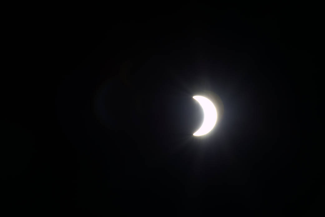 Sun appears as a crescent with moon passing in front during March 20, 2015 solar eclipse