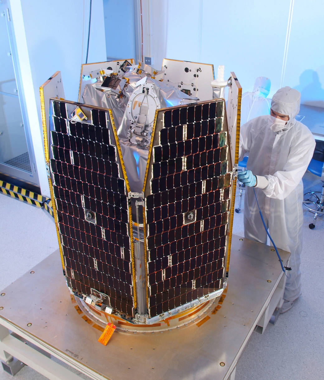 The AIM spacecraft undergoes solar array deployment tests at Orbital's Dulles, Virginia.