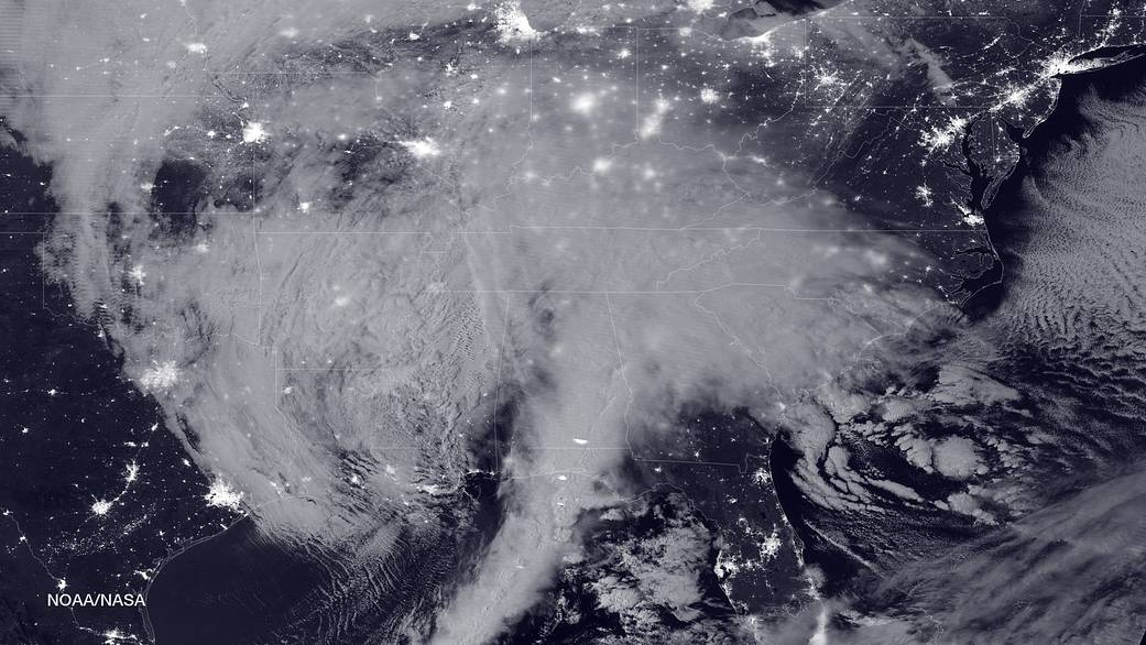 Satellite image at night of blizzard forming over U.S. east coast