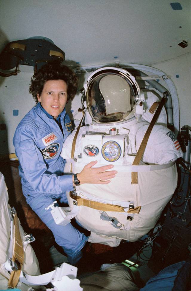 Dr. Kathryn Sullivan, a veteran of three space shuttle flights, made history on STS-41G as the first American woman to walk in space.