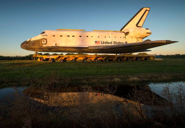 Space shuttle Atlantis is seen as it rolls down Kennedy Parkway on its way to its new home at the Kennedy Space Center Visitor Complex, Friday, Nov. 2, 2012, in Cape Canaveral, Fla. 