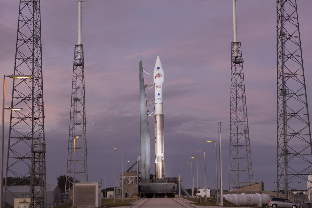 Rocket with MAVEN spacecraft on board at launch pad at dusk