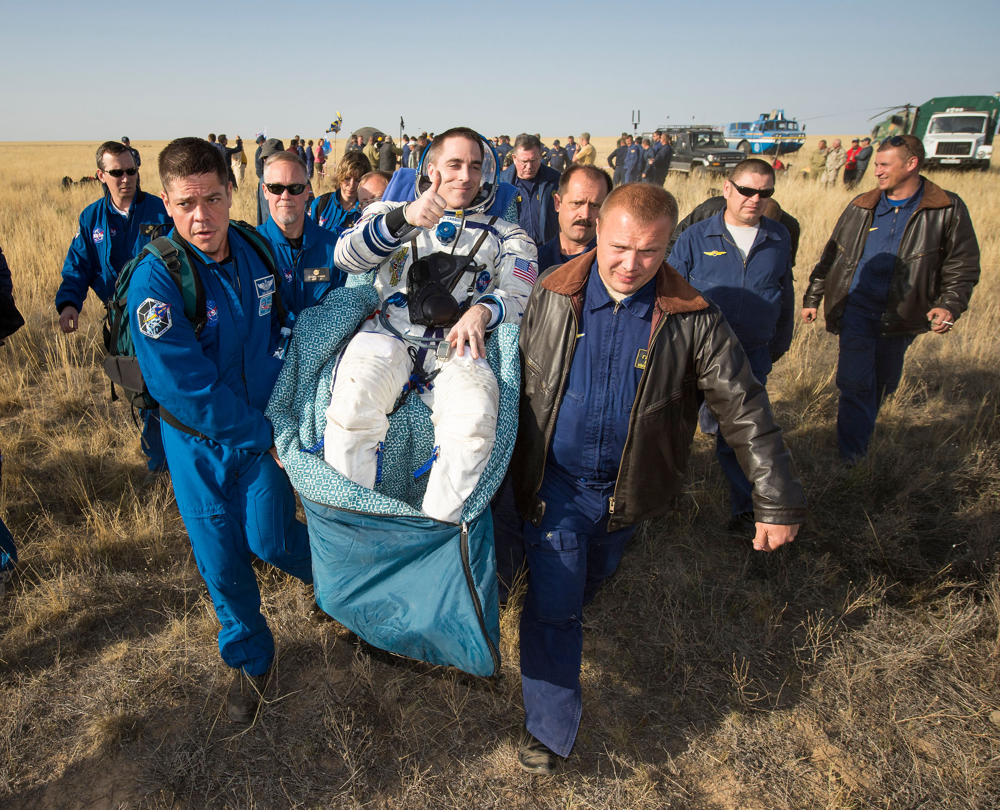 Chris Cassidy of NASA is carried to the medical tent
