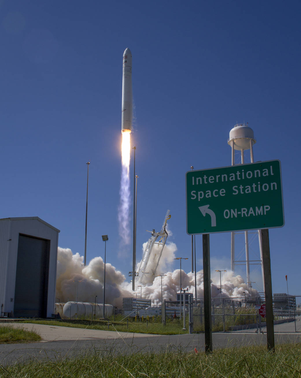 A sign points the way as the Antares rocket launches from Wallops Flight Facility.