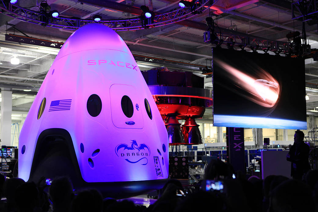 The SpaceX Dragon V2 spacecraft is unveiled at company headquarters in Hawthorne, Calif.