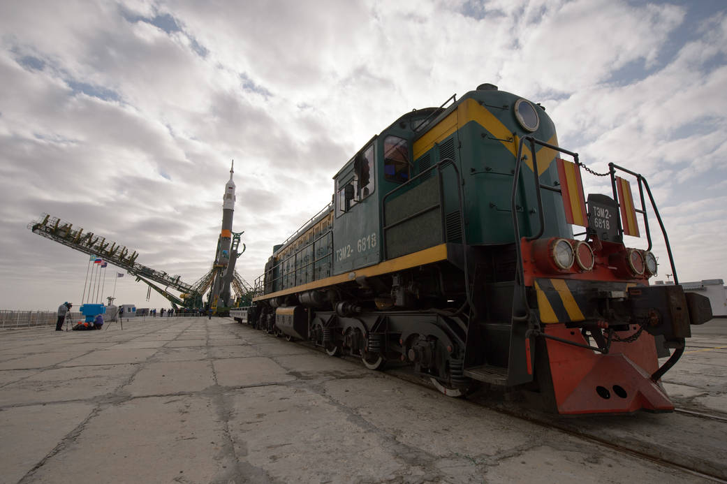 Gantry Arms Begin to Close Around Soyuz TMA-12M