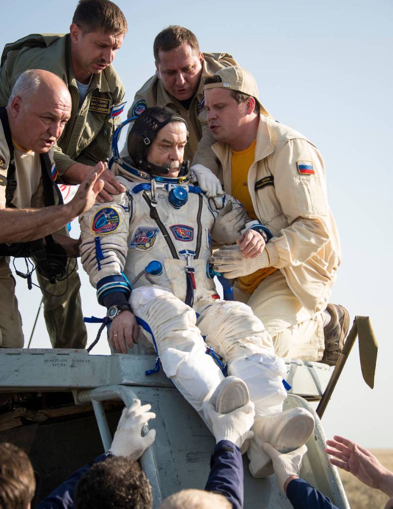 Mikhail Tyurin is Helped Out of the Soyuz