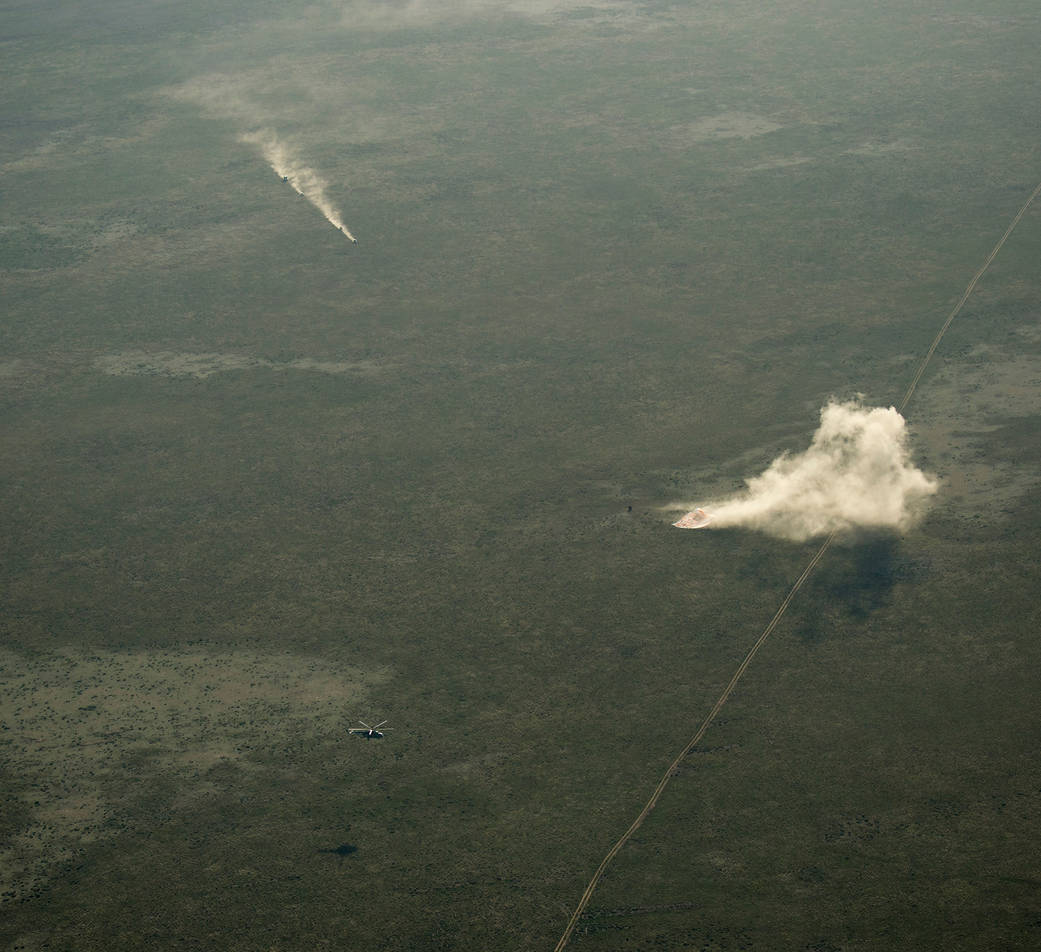 Ground Personnel Race to Soyuz Landing Site