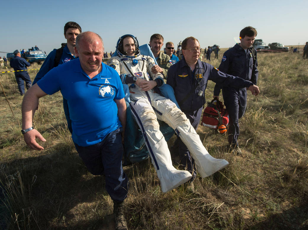 Rick Mastracchio is Carried to Medical Tent