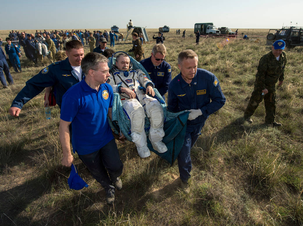 Mikhail Tyurin is Carried to Medical Tent