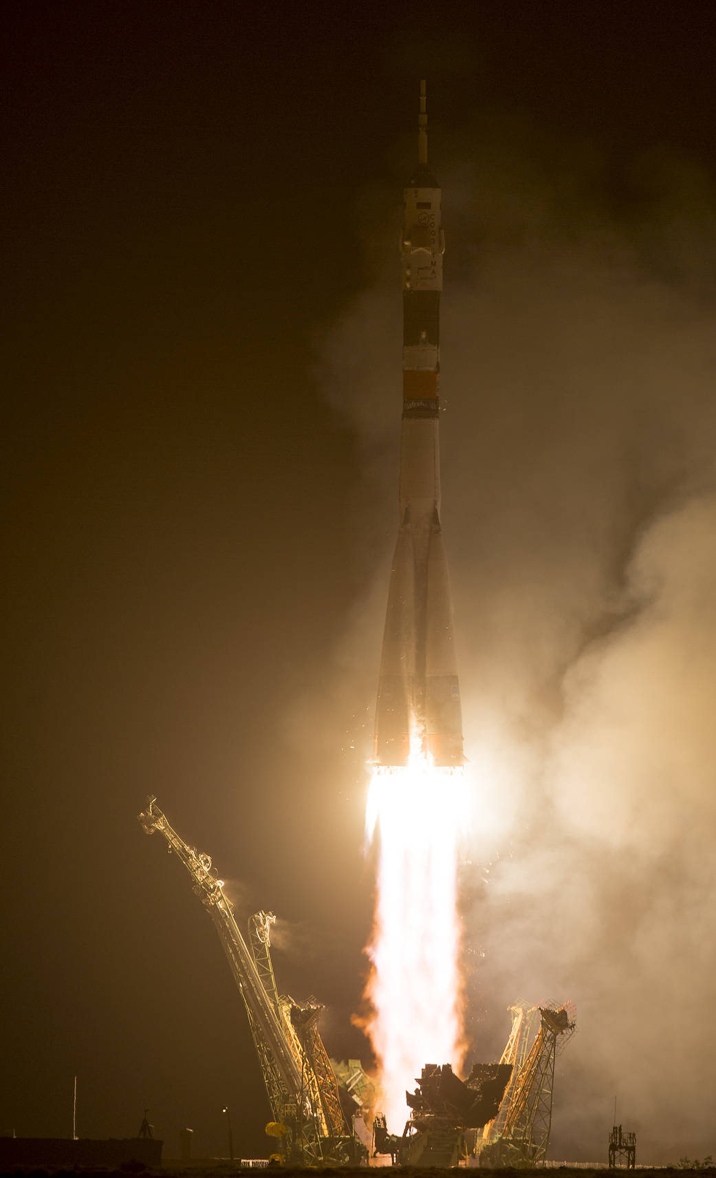 The Soyuz TMA-13M rocket is launched with Expedition 40 Soyuz Commander Maxim Suraev, of the Russian Federal Space Agency, Rosco