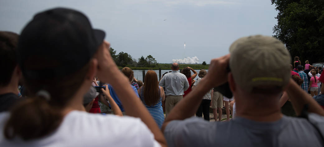 Crowd Watches Launch of Cygnus Cargo Craft