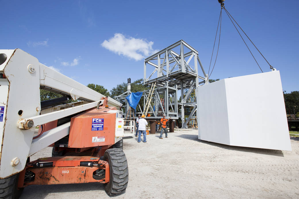 Workers connect White Room to Crew Access Arm