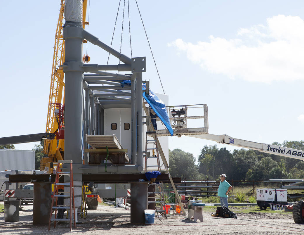 Workers connect White Room to Crew Access Arm