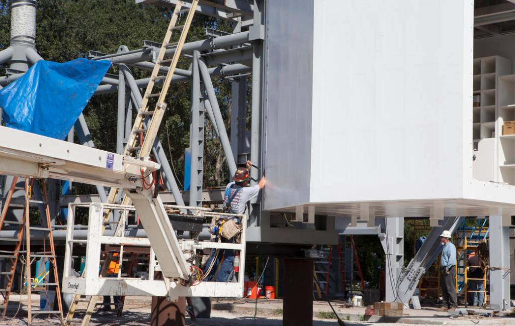 Workers Connect White Room to Crew Access Arm
