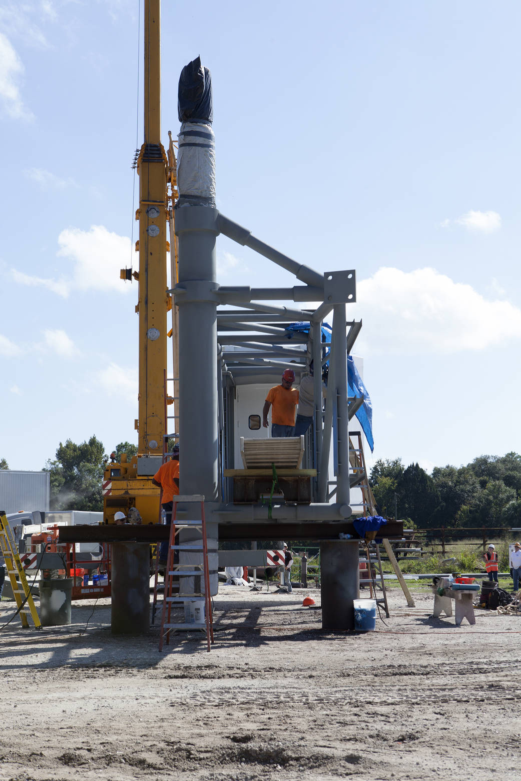 Workers connect White Room to Crew Access Arm