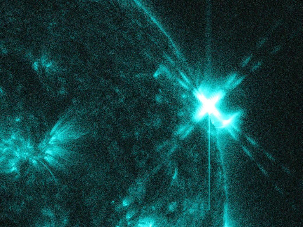 A mid-level flare, an M8.2-class, erupted from the right side of the sun on March 2, 2015. 