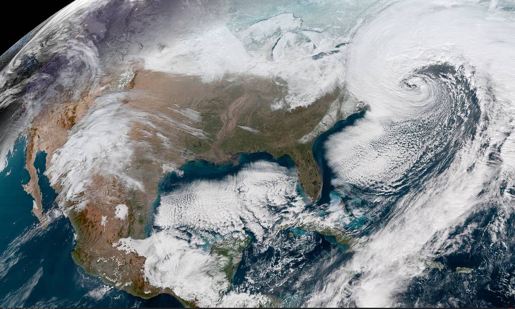 Satellite image of United States with storm clouds off East Coast
