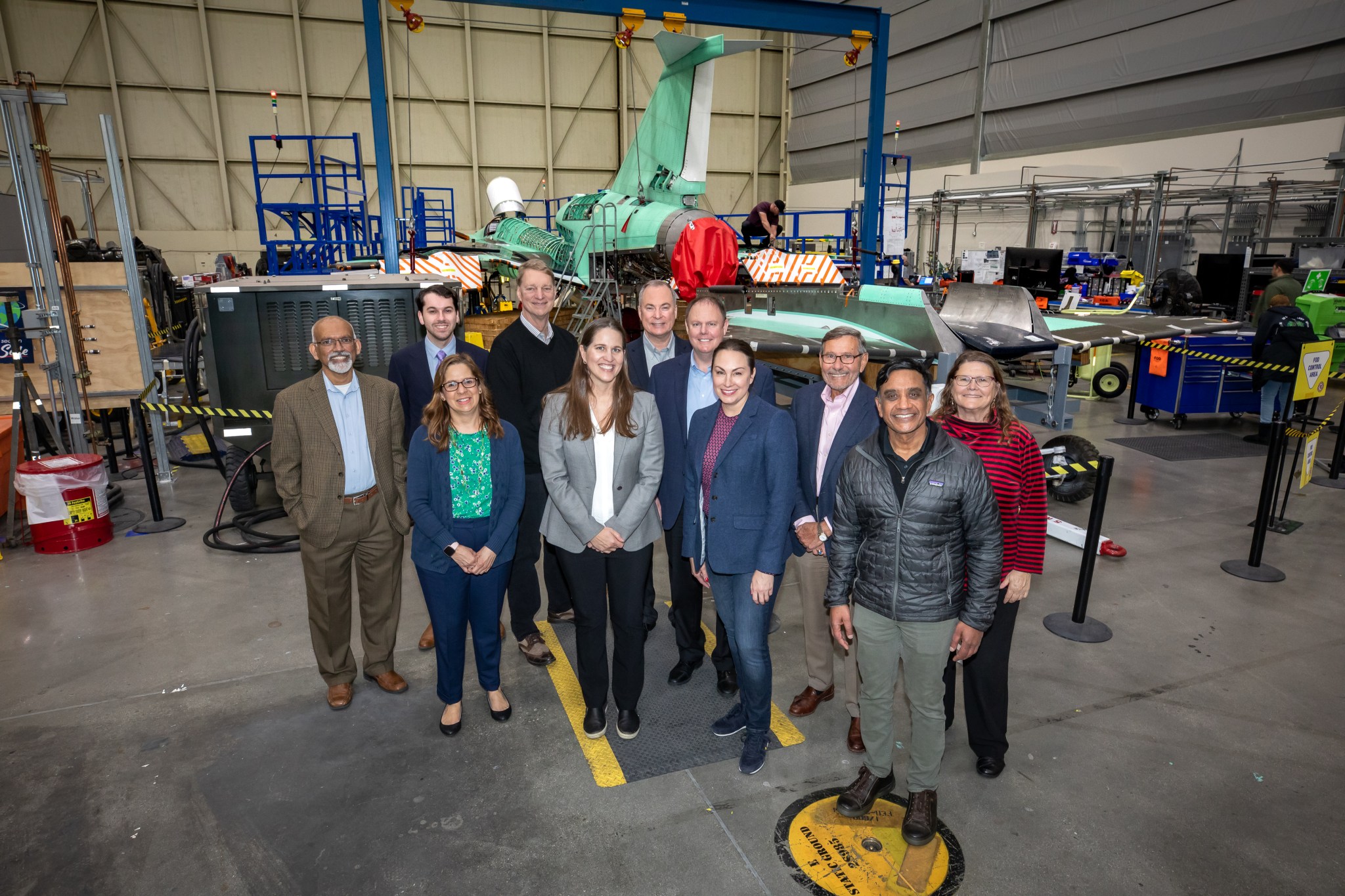 NAC Committee members from the 2023 March meeting in a tour of the X-59.