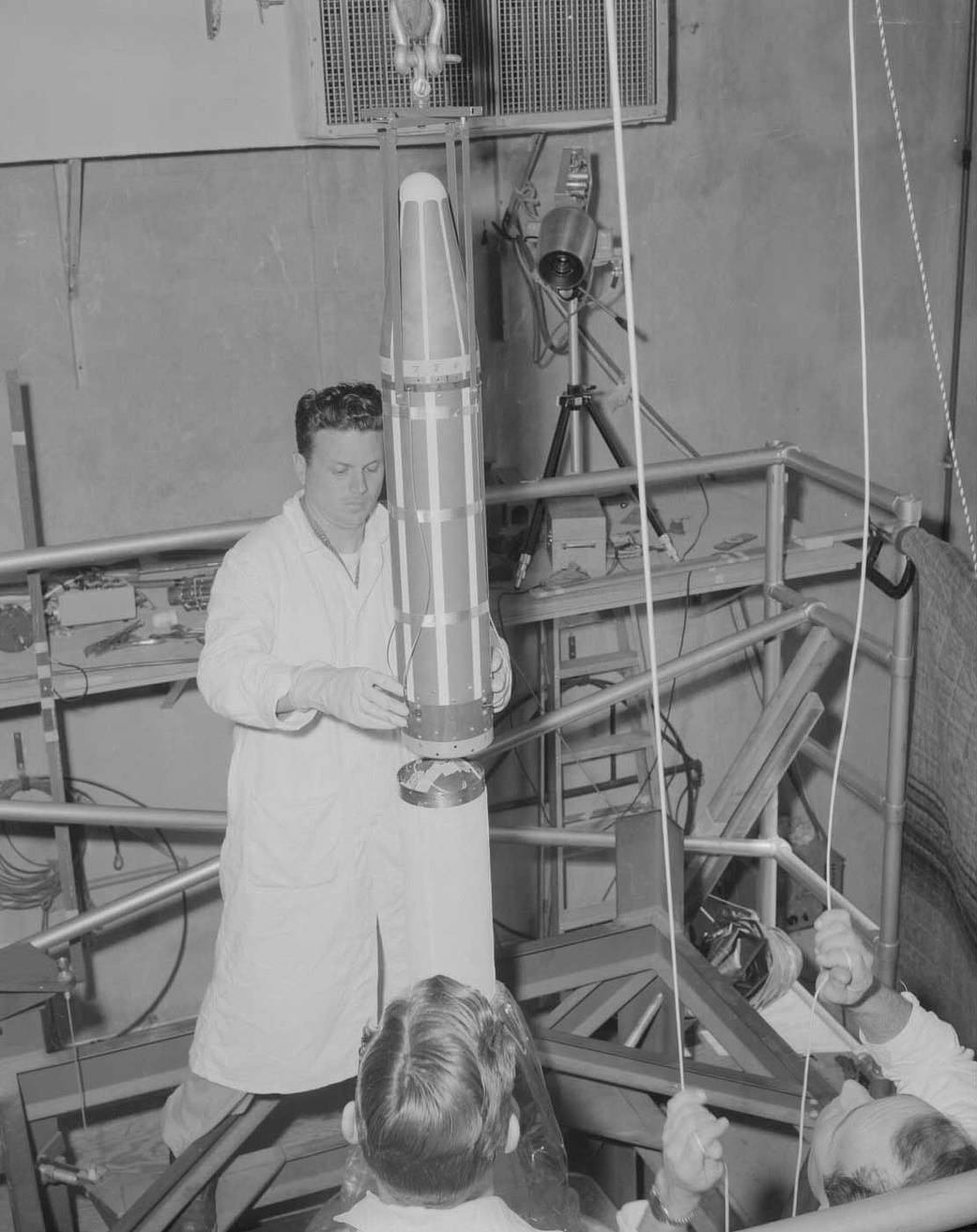 Technician with Explorer 1 rocket