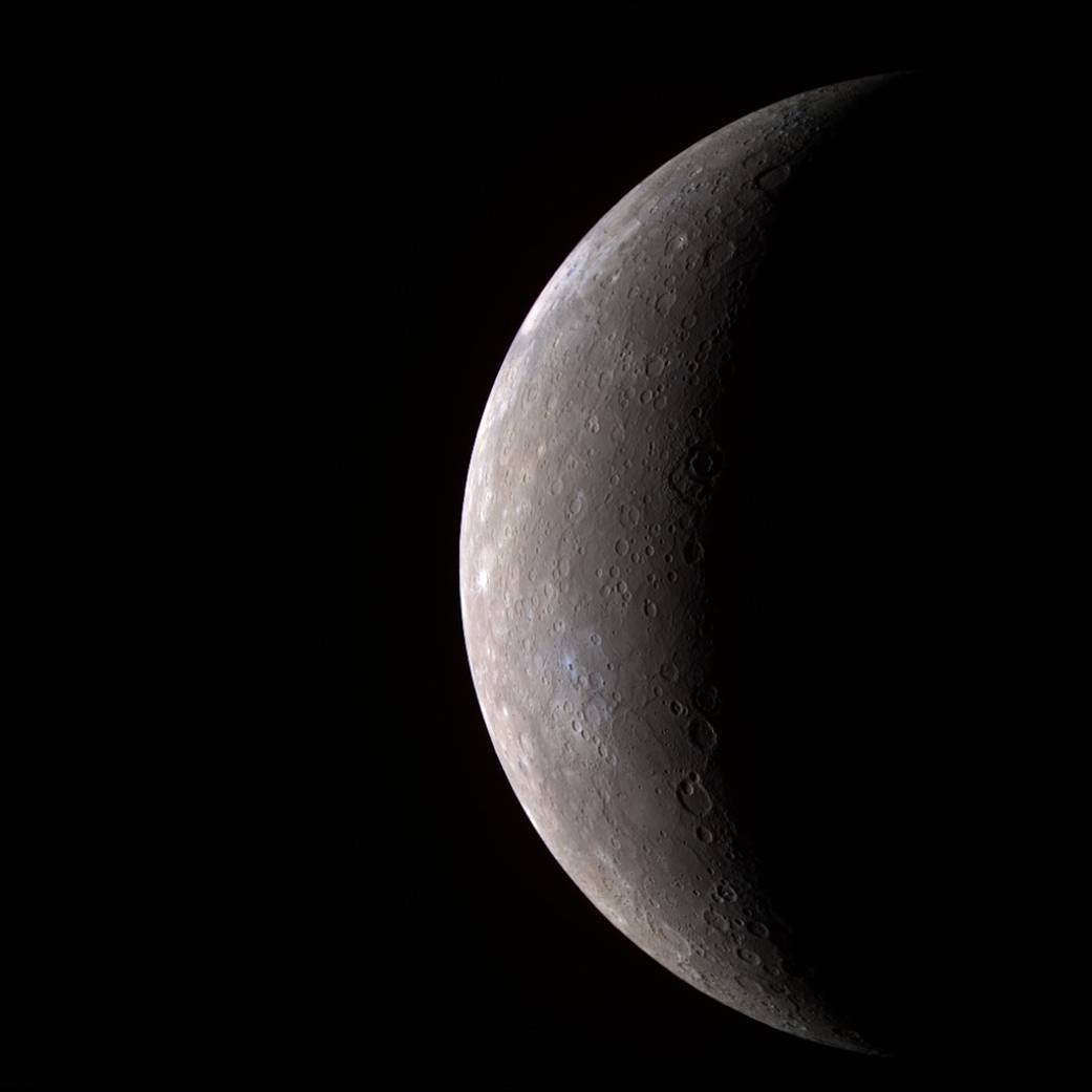 Color image of planet Mercury showing illuminated crescent and shadow