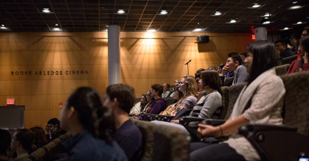 Audience Members Watch a Short Video During “The Martian” Panel at Columbia University