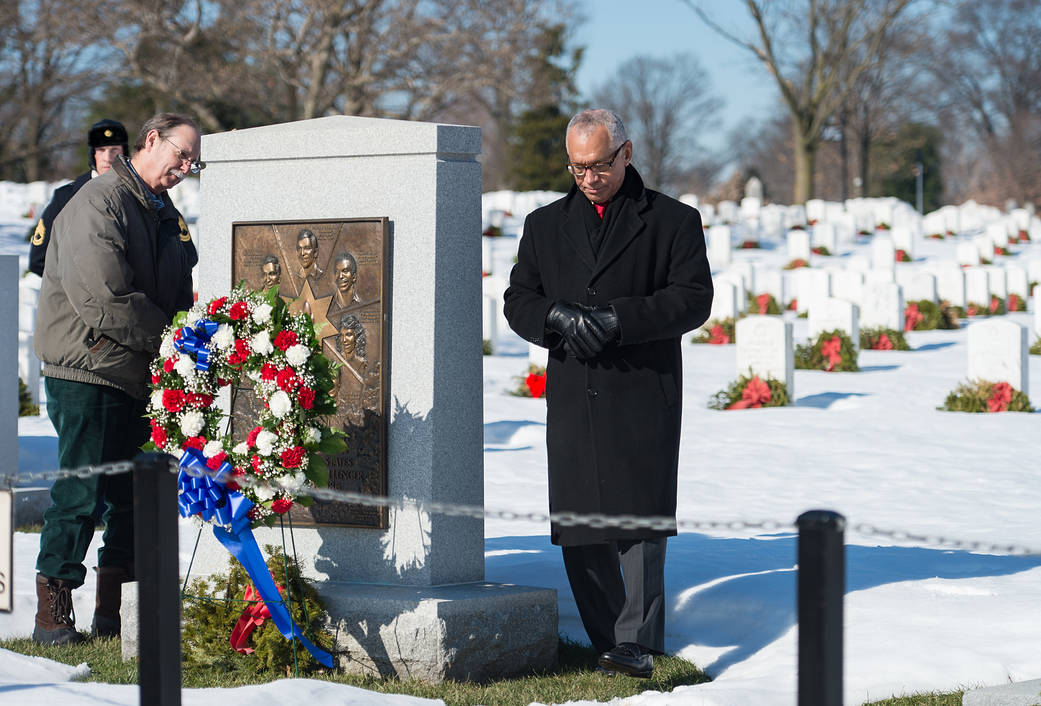 Chuck Resnik and NASA Administrator Charles Bolden at Challenger Memorial at Arlington National Cemetery with wreath in front