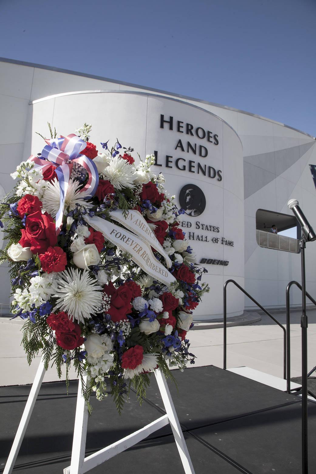 Memorial wreath in front of Heroes and Legends exhibit