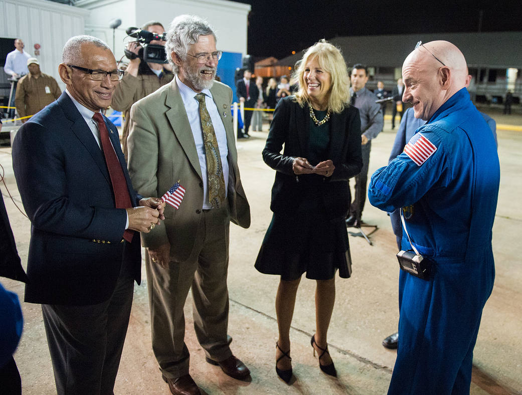 Expedition 46 Commander Scott Kelly of NASA, right, is seen with NASA Administrator Charles Bolden, left, Dr. John Holdren, dire
