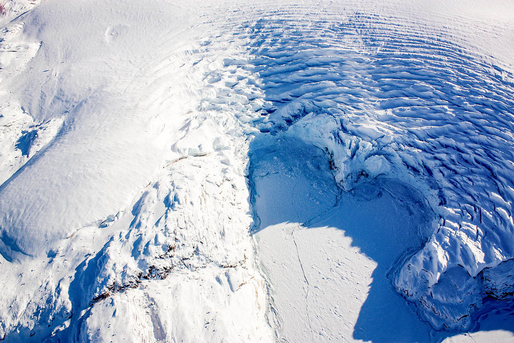 heart-shaped calving front of a glacier in northwest Greenland, as seen during an Operation IceBridge flight on Mar. 27, 2017