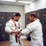 Paul Weitz and Joe Kerwin try on their spacesuits at Johnson Space Center during training