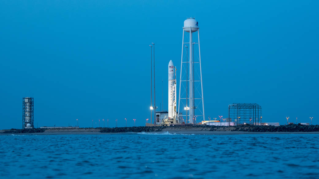 Orbital ATK Antares rocket at launchpad at sunrise