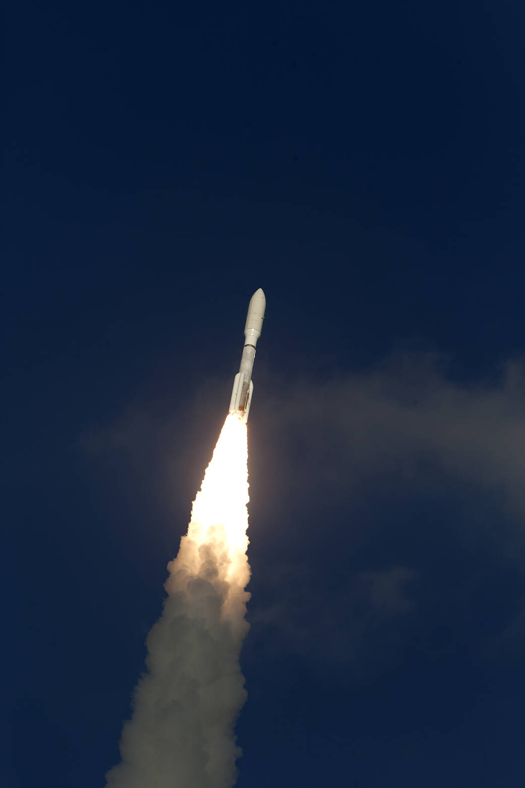 Rocket with NOAA satellite streaks through sky toward orbit