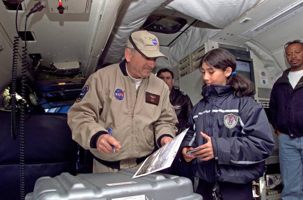 Dr. Tom Mace Explains AirSAR to Student from Punta Arenas, Chile