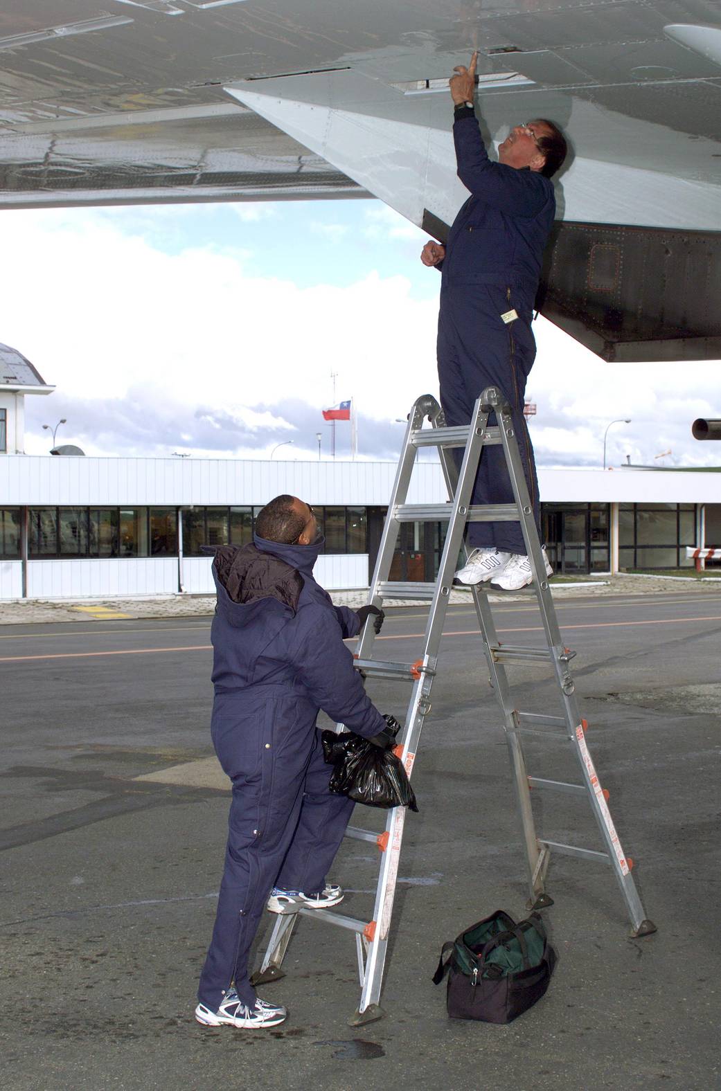 NASA DC-8 Technicians Perform Routine Maintenance