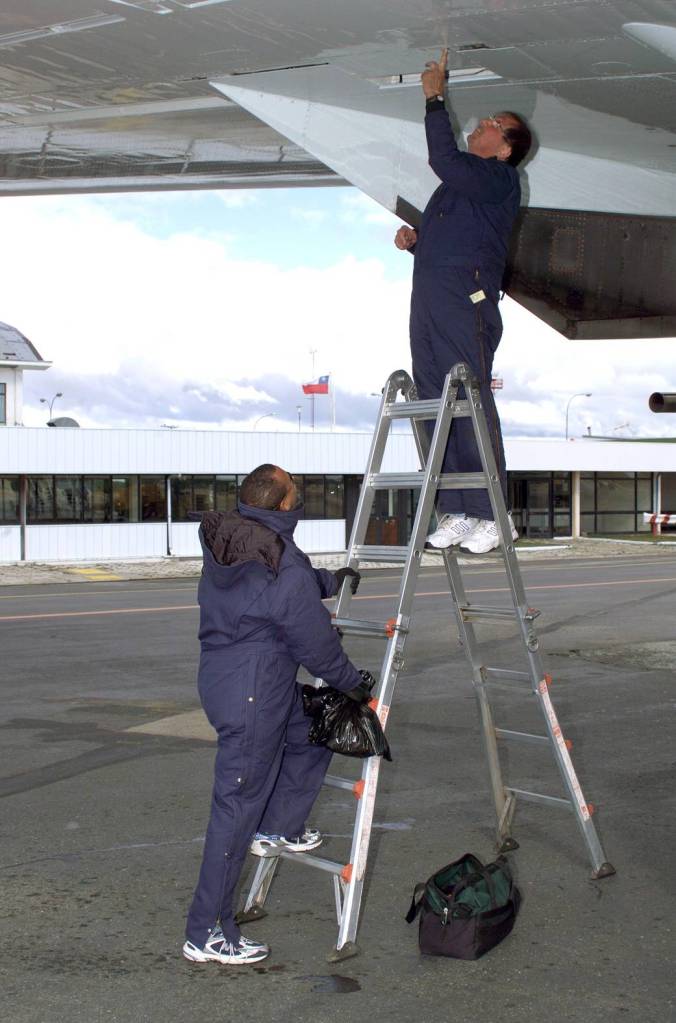 NASA DC-8 Technicians Perform Routine Maintenance