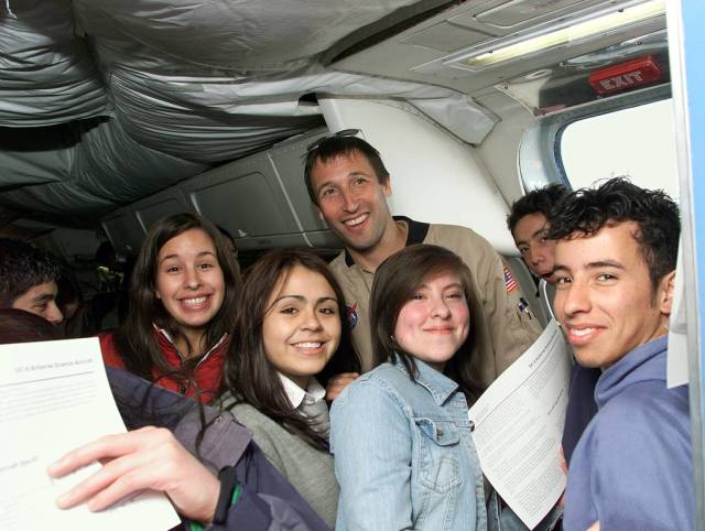 NASA DC-8 Mission Manager Walter Klein Poses with Chilean Students